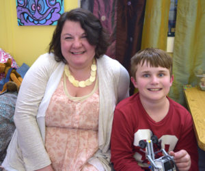 Rachel Hamlin, gifted-and-talented teacher at the Wiscasset School Department, with one of her students, Camden Larrabee. Camden designed and crafted a pedal extension for Hamlin's daughter's wheelchair. (Jessica Clifford photo)