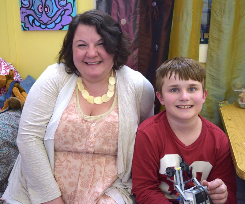 Rachel Hamlin, gifted-and-talented teacher at the Wiscasset School Department, with one of her students, Camden Larrabee. Camden designed and crafted a pedal extension for Hamlin's daughter's wheelchair. (Jessica Clifford photo)