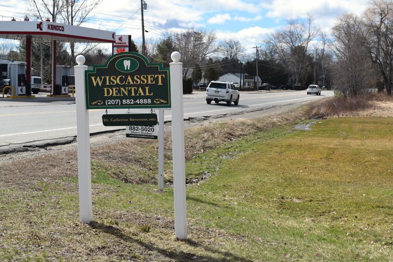 The Wiscasset Dental sign alongside Route 27 in Wiscasset. Lincoln County Dental Inc. has purchased the former Wiscasset Dental building, where it will open a low-income clinic. (Jessica Clifford photo)