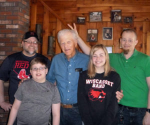 Casey Main (right) poses for a photo with family. "We feel this captures his great sense of humor," his mother said of the photo. From left: Casey Main's brother, Chris Main; nephew, Cameron Main; grandfather, Howard Cederlund; neice, Kaitlyn Main; and Casey Main. (Photo courtesy Judi Main)