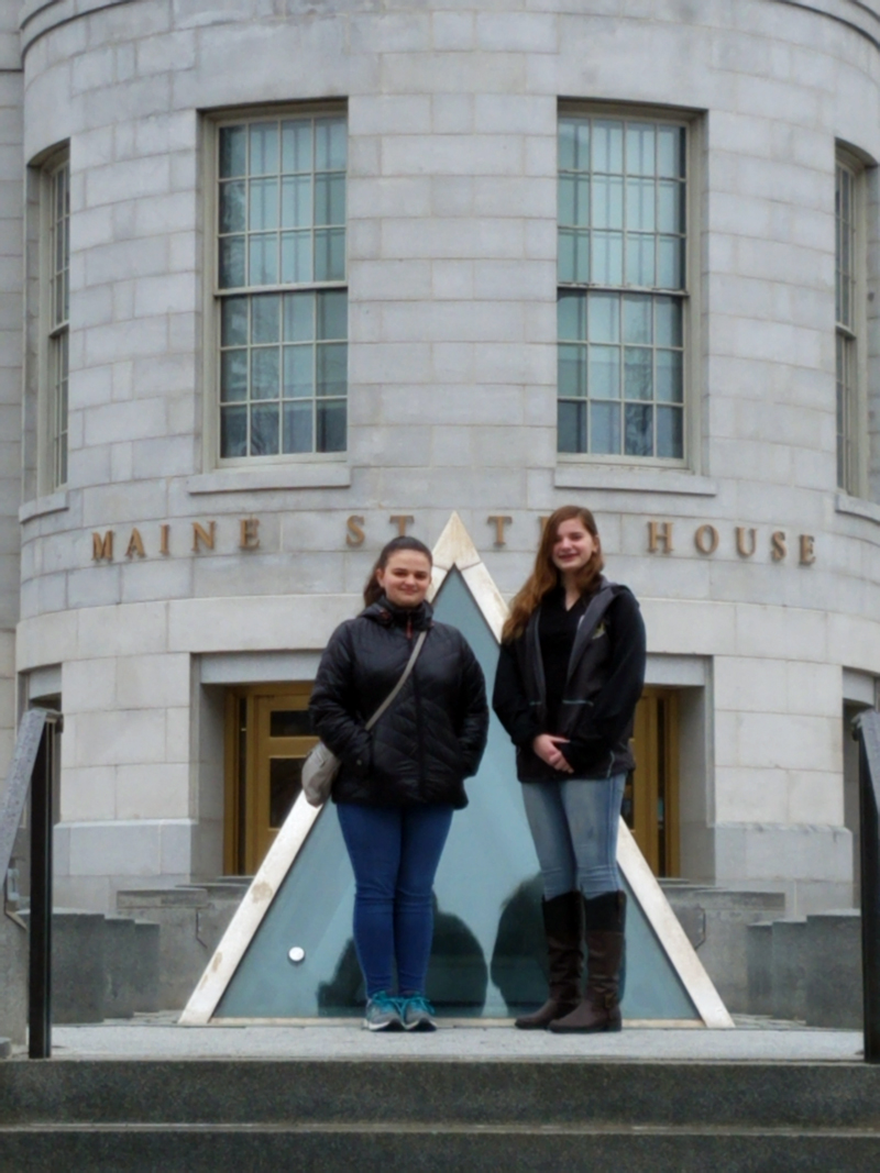 Wiscasset eighth-graders Carolyn Potter and Madison Westrich at the Maine State House.