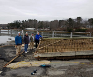 A community effort at the town landing.