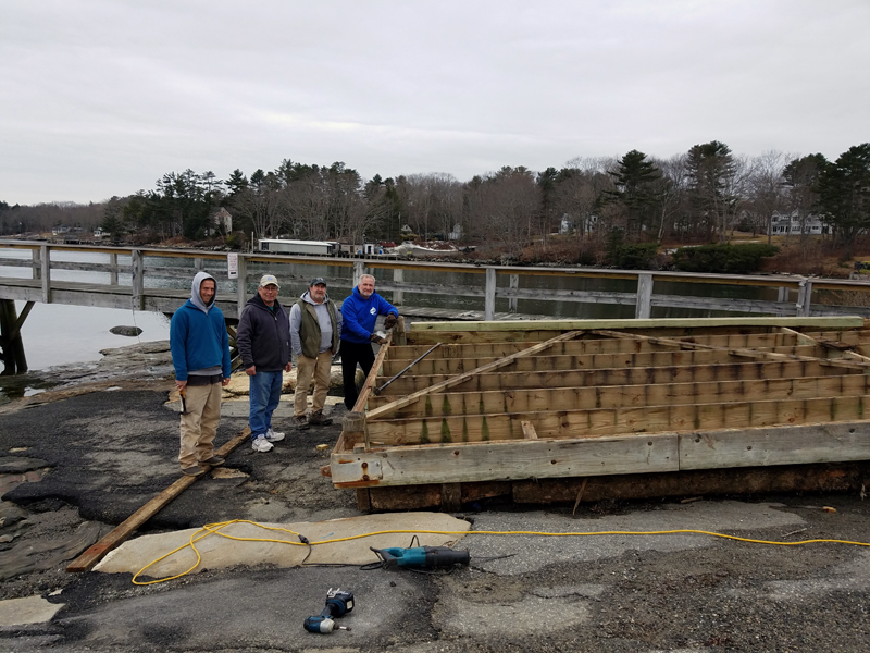 A community effort at the town landing.