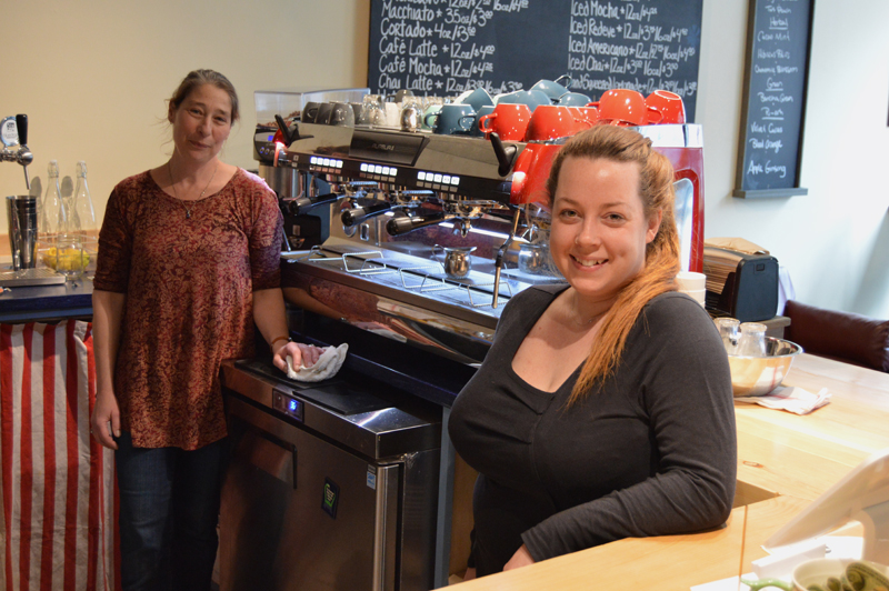 Cupacity owner Susan Murphy stands with her good friend and store operations manager Samantha Merrill at the front counter of the new coffee shop in downtown Damariscotta. Cupacity officially opened May 18. (Evan Houk photo)