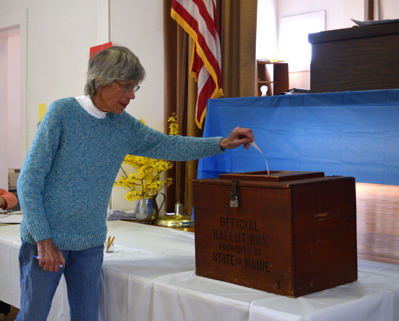 Edgecomb resident Zibette Dean casts a ballot during annual town meeting Saturday, May 18. (Jessica Clifford photo)