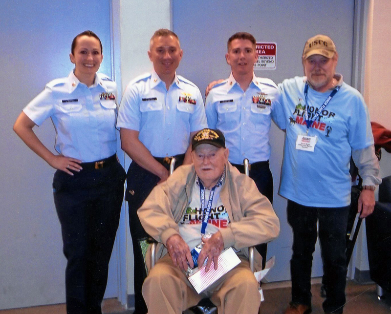 U.S. Coast Guardsmen welcome 32-year veteran Eugene Walsh, of Newcastle, back to Portland on April 28. From left: Morgan Olson, Geoff Potter, Eugene Walsh, David McDonald, and Dennis Walsh. (Photo courtesy Marie Walsh)