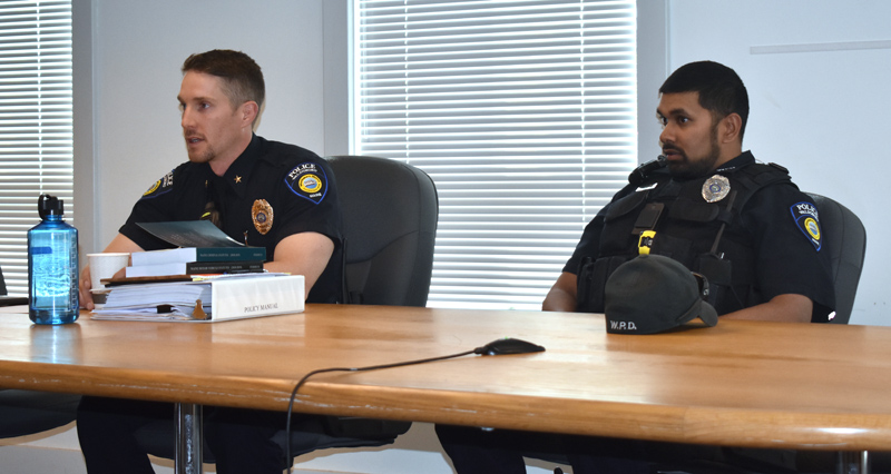 Waldoboro Police Chief John Lash (left) and Officer Nathaniel Jack host a question-and-answer session at the municipal building the evening of Wednesday, May 22. (Alexander Violo photo)