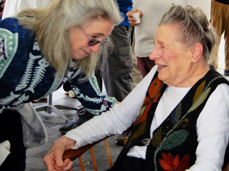 Jerry Day Mason (right) shares a moment with her daughter, Jody Brown, of Wiscasset, during Mason's 100th birthday party at her Westport Island home May 4. (Photo courtesy Gaye Wagner)