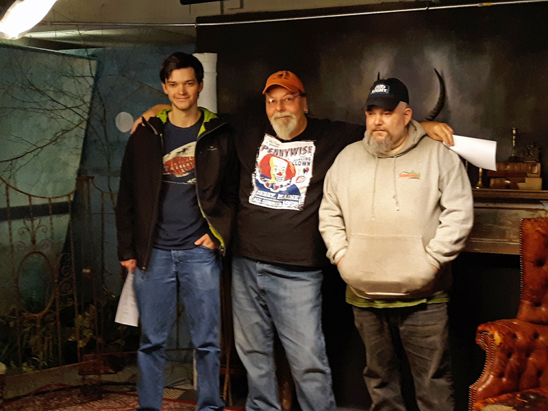 Co-producer Hunter Reid (left) and co-producer Dana Brown (right) greet program host Glenn Chadborne (center).