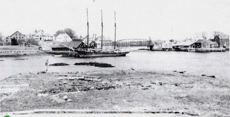 A ship docked at T.E. Gay's coal sheds, Newcastle, 1912.