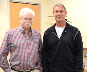 John Reny, of the Renys department stores, and Robert Clifford, of Colby & Gale Inc. and The Community Energy Fund of Lincoln County. A $50,000 gift from the Reny Charitable Foundation will enable The Community Energy Fund to expand its work to the repair and replacement of home heating systems. (Evan Houk photo)