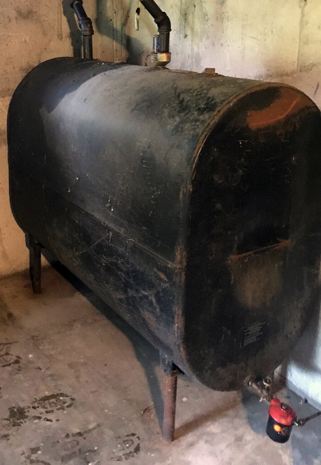 The Community Energy Fund of Lincoln County recently replaced this aging tank as part of a new program to fix or replace heating systems for residents in need. (Photo courtesy Brad Lunt)