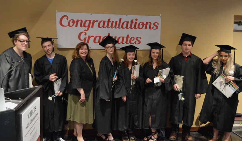 Seven members of the Central Lincoln County Adult Education Class of 2019 stand with their commencement speaker, Maine Labor Commissioner Laura Fortman. From left: Kelvyn Olsen, Haven Simmons, Fortman, Karlyne Olsen, Breanna Blanchard, Sarah Gemeinhardt, Marc Manning, and Logan Delano. (Evan Houk photo)