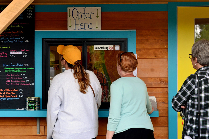 Customers line up to order at Larson's Lunch Box on its first day of the season, Thursday, June 20. (Nettie Hoagland photo)