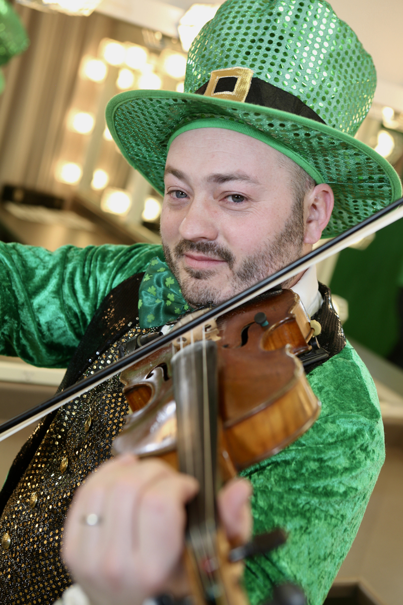 Damon Leibert in full fiddle-playing leprechaun mode. (Photo courtesy Damon Leibert)