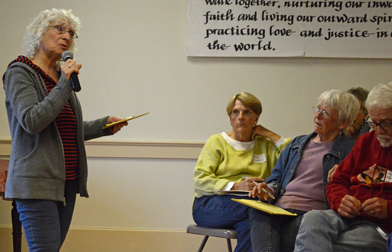 Mary Voskian, of Helping Hands for Immigrants, Refugees, and Asylum-Seekers, speaks to a crowd of nearly 50 people at The Second Congregational Church in Newcastle on Thursday, June 20. (Evan Houk photo)