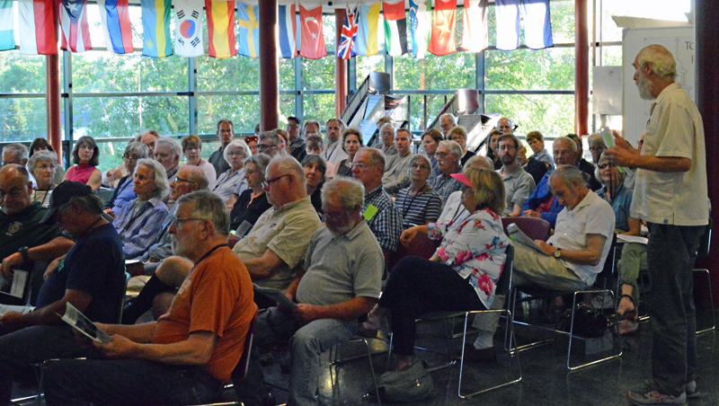 Skidompha Library Board of Directors member Rem Briggs (standing at far right) speaks about the library's services during Newcastle's annual town meeting in the Lincoln Academy Alumni Dining Commons on Monday, June 17. (Evan Houk photo)