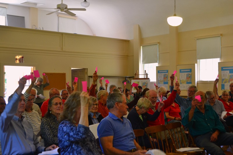 Westport Island voters approve $465,000 for the first phase of a long-term roads plan during annual town meeting at the historic town hall Saturday, June 22. (Charlotte Boynton photo)