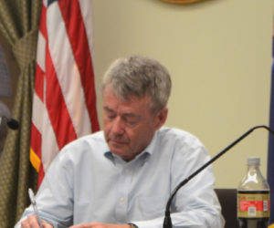 Wiscasset Town Manager John O'Connell takes notes during a selectmen's meeting at the town office Tuesday, June 4. O'Connell is now the permanent town manager after four months in an interim role. (Charlotte Boynton photo)