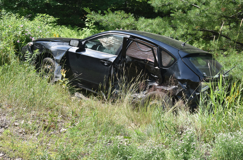 A Subaru Impreza off Cross Road in Edgecomb after a collision at the intersection with Route 1 on Sunday, July 14. (Alexander Violo photo)