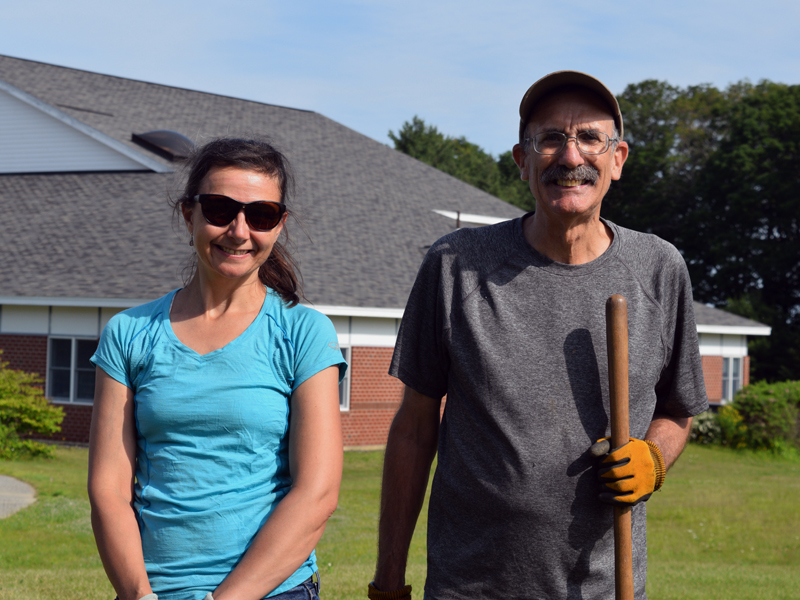 Boothbay Harbor Rotary Club members Ingrid Merrill and Bill Prince volunteer at the Edgecomb Eddy School and Family Garden. Merrill organized the effort to revitalize the garden, while Prince has lent his gardening expertise. (Jessica Clifford photo)