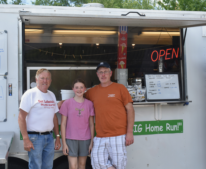 From left: Kendall Delano Sr., Dakota Brackett, and Kendall Delano Jr. at the Delano Seafood Shack in Waldoboro. (Alexander Violo photo)