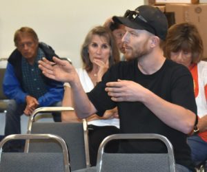 John Grotton, resource and production manager at Atlantic Laboratories Inc., of Waldoboro, speaks during a public hearing on improvements to the Dutch Neck landing Monday, July 22. (Alexander Violo photo)