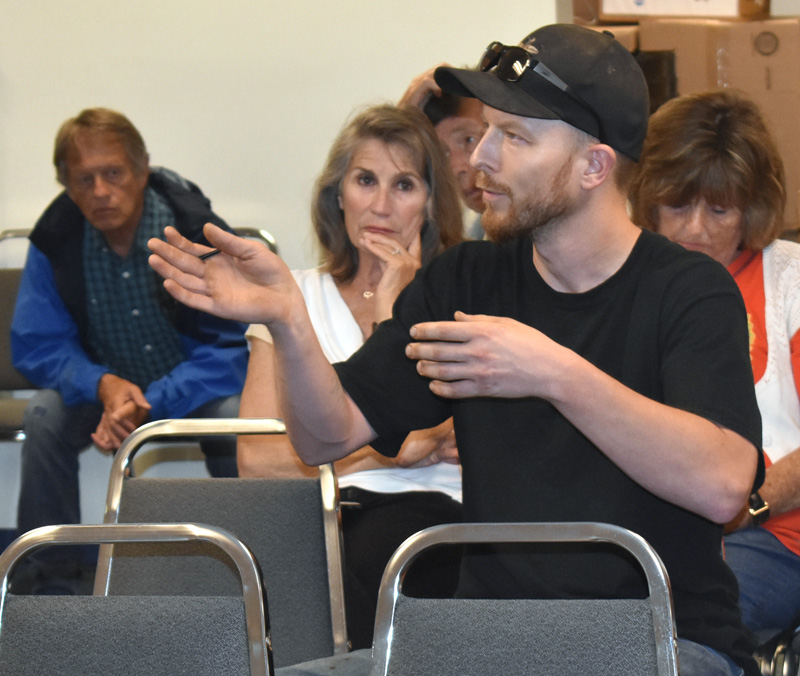 John Grotton, resource and production manager at Atlantic Laboratories Inc., of Waldoboro, speaks during a public hearing on improvements to the Dutch Neck landing Monday, July 22. (Alexander Violo photo)