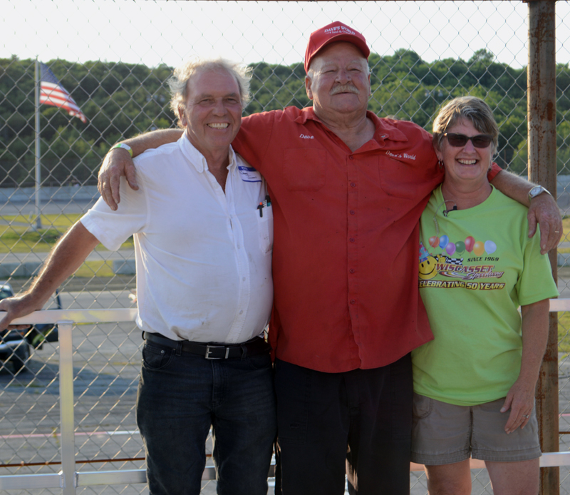 Wiscasset Speedway owners Richard and Vanessa Jordan stand with former track owner Dave "Boss Hogg" St. Clair (center), during his induction into the Wiscasset Speedway Hall of Fame, Saturday, July 27. (Evan Houk photo)