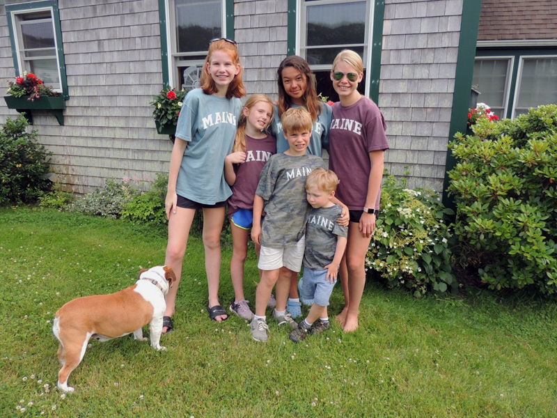 The Sawyer grandchildren with their treasurer, Bella the bulldog.