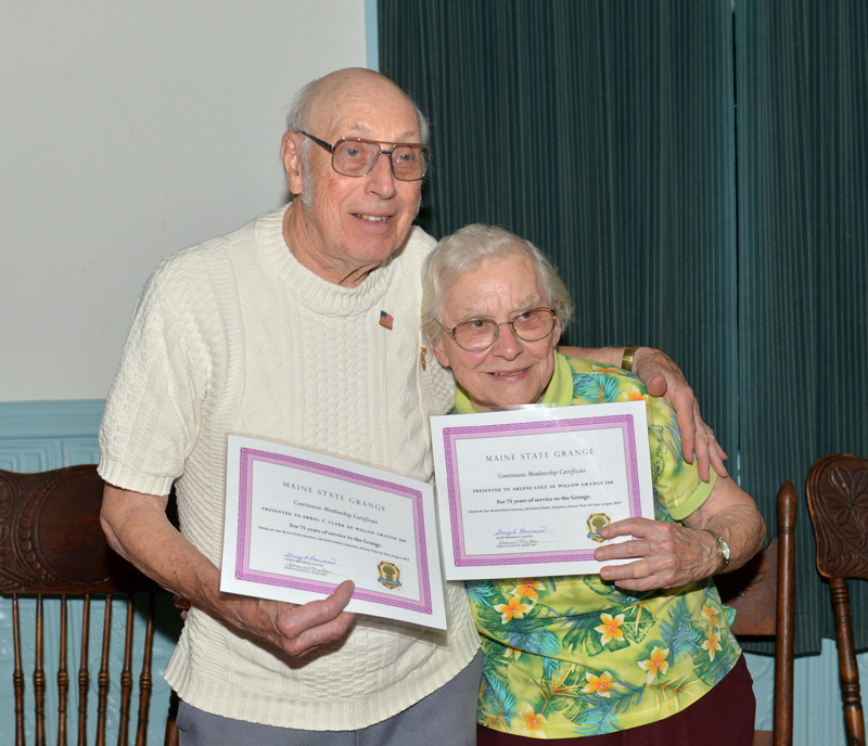 Errol T. Clark and Arlene Cole are presented 75-year certificates for continuous membership at Willow Grange on Thursday, July 25. (Paula Roberts photo)