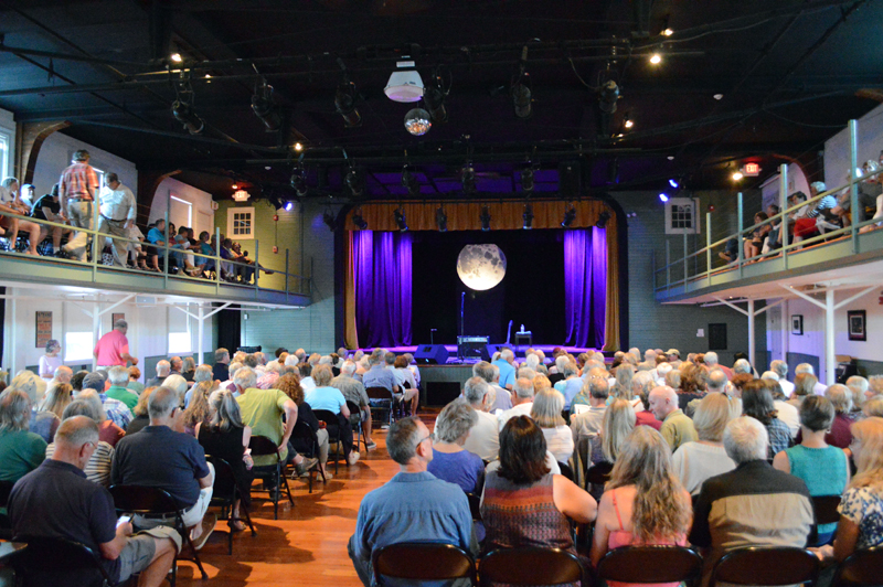 A packed house waits for John Sebastian to take the stage at 7:30 p.m. on Thursday, July 25 at the Opera House at Boothbay Harbor. Sebastian interspersed all his songs with various stories from his 50-plus years in the music industry. (Evan Houk photo)