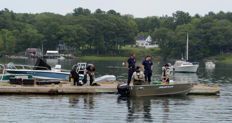 Maine Marine Patrol and Maine State Police personnel, including divers, prepare to continue the search for a Bremen man in Round Pond Harbor the morning of Tuesday, Aug. 13. (Evan Houk photo)