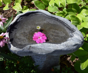 Rachiel Norwood's "Oyster Shell Bird Bath" welcomes visitors to Damariscotta's Stable Gallery. (Christine LaPado-Breglia photo)