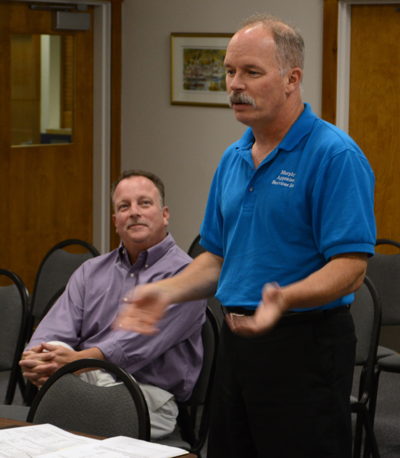 Brothers Matt (left) and Jim Murphy, of Murphy Appraisal Services Inc., meet with the Damariscotta Board of Selectmen on Aug. 21. The town recently contracted the firm to provide assessing services. (Evan Houk photo)