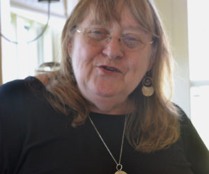 Monhegan artist Corlis Carroll, who specializes in the art of the painted photograph. (Christine LaPado-Breglia photo)