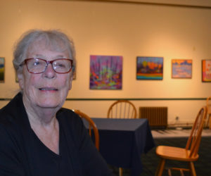 Southport artist June Elderkin chats about the work in her exhibit in the gallery at The Opera House at Boothbay Harbor on Thursday, Aug. 15. (Christine LaPado-Breglia photo)