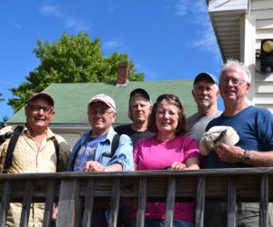 Chip Inc. volunteers stand on the ramp at Lincoln County Dental Inc. in Wiscasset on Friday, Aug. 23. From left: Dave Sellers, Gerry Brookes, Mal Briggs, Susan Lamb, C.R. Davis, and Tim Mellen. (Jessica Clifford photo)