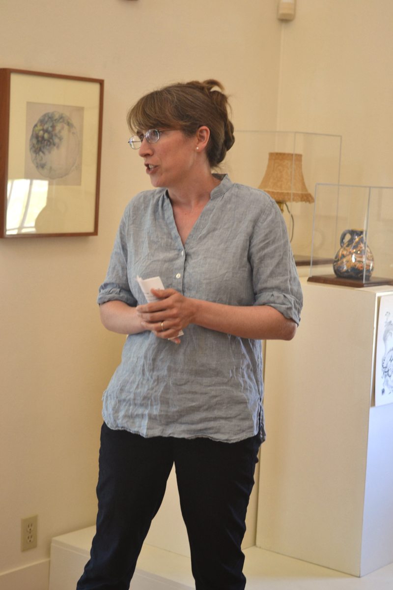 Emily Grey, the curator of exhibitions at the Monhegan Museum of Art & History, gives a gallery talk about the museum's "A Life Made in Art: Maud Briggs Knowlton" exhibit on the afternoon of Aug. 2. (Christine LaPado-Breglia photo)