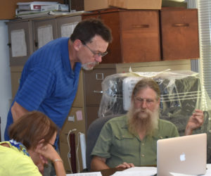 John Kelly (left) discusses his plans for a bakery at the intersection of Route 1 and East Pond Road with Nobleboro Planning Board Chair Steve Plumb. (Alexander Violo photo)