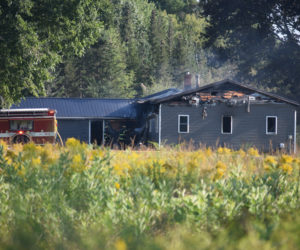 Fire damage is visible on a structure on Feylers Corner Road in Waldoboro the afternoon of Sunday, Aug. 25. (Jessica Clifford photo)