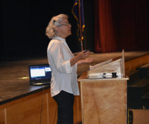 Colleen Coogan, a take reduction team coordinator with the National Oceanic and Atmospheric Administration, speaks at Medomak Valley High School in Waldoboro. (Alexander Violo photo)