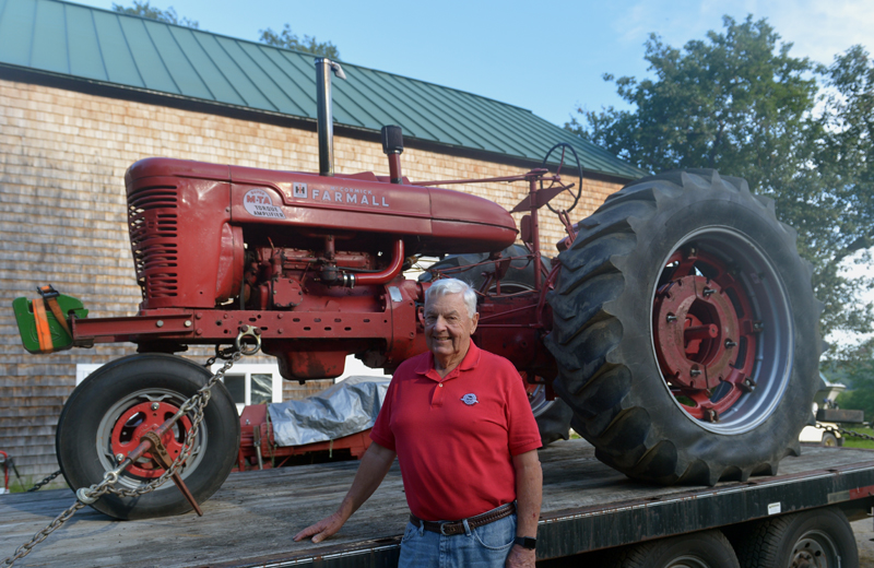 Jack Studley, of Nobleboro, with his 1954 International Super M-TA Torque Amplifier stock pulling tractor. (Paula Roberts photo)