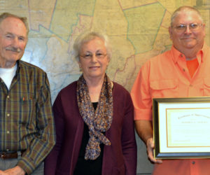 From left: Daniel Davey, Laurinda Cushman, and Jeffrey Sewall at the Lincoln County Board of Commissioners meeting Tuesday, Sept. 17. Daniel Davey and Cushman are the brother and widow of Lincoln County Sheriff's Office Detective Sgt. Donald Davey, who died in a crash while on duty July 30, 1984. Sewall, a former sheriff's deputy, responded to the crash. (Charlotte Boynton photo)