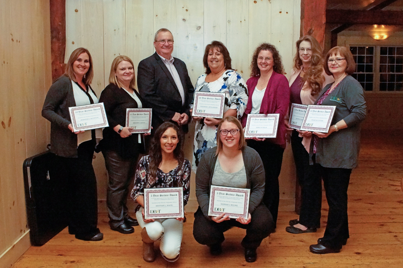 Damariscotta Bank & Trusts employees with certificates of recognition for their 5, 10, and 15 years of service at the annual Employee Recognition Night.