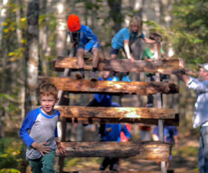 Going up and over an obstacle on the kids course.