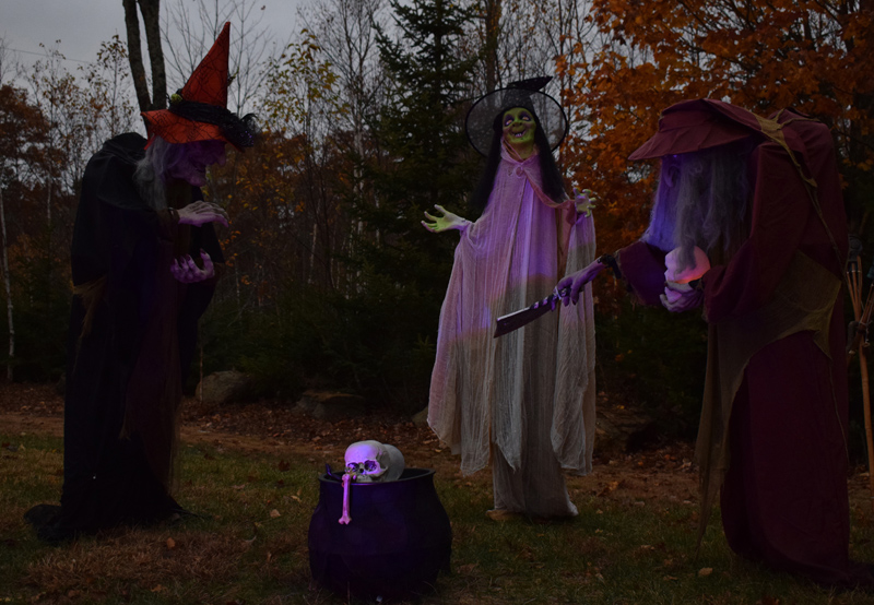 A trio of witches surrounds a kettle at 58 Cushing Farm Road in New Harbor. The property is home to Terri and Steven Sylvester, who are opening their display to the community for their first Halloween in the area. (Evan Houk photo)