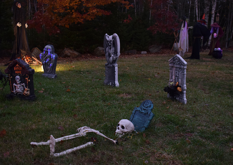 A skeleton appears to emerge from a grave at 58 Cushing Farm Road in New Harbor. The elaborate Halloween display is open to the public. (Evan Houk photo)