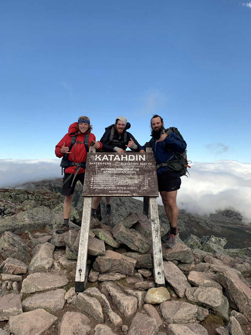 From left: Dalton Leeman and Bo McLain, of Bristol, and fellow hiker Tim Lawrence, of New Jersey, pose for a photo at the peak of Mount Katahdin upon completing their 2,200-mile hike of the Appalachian Trail. (Photo courtesy Bo McLain)