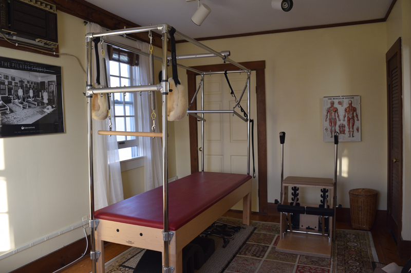 Two pieces of Pilates equipment at Pilates and Feldenkrais Studio in Damariscotta: the Cadillac (left) and the chair. (Jessica Clifford photo)